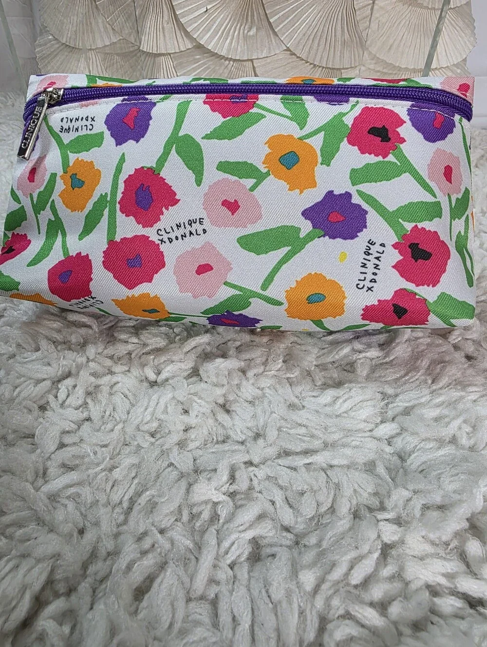 Clinique Floral Cosmetic Bag in White with Pink, Purple & Orange Blooms
